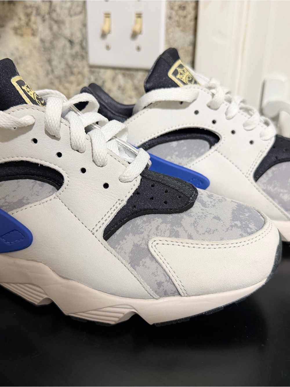 Nike Women’s White, Blue and Black Athletic Sneakers